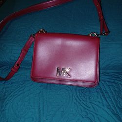 ORIGINAL MK. ALL LEATHER INSIDE END OUTSIDE .I USED ONLY ONE TIME CRISTMAS DAY . WAS A GIF  BUT TO SMALL FOR MI . I GIVE GOOD PRICE  $75 : 00  