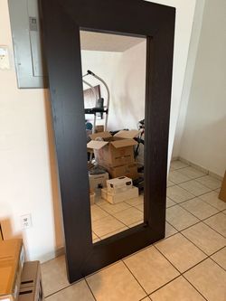 Mirror wooden Brown framed.