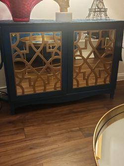Teal Blue Cabinet with Gold Lattice Mirror Doors