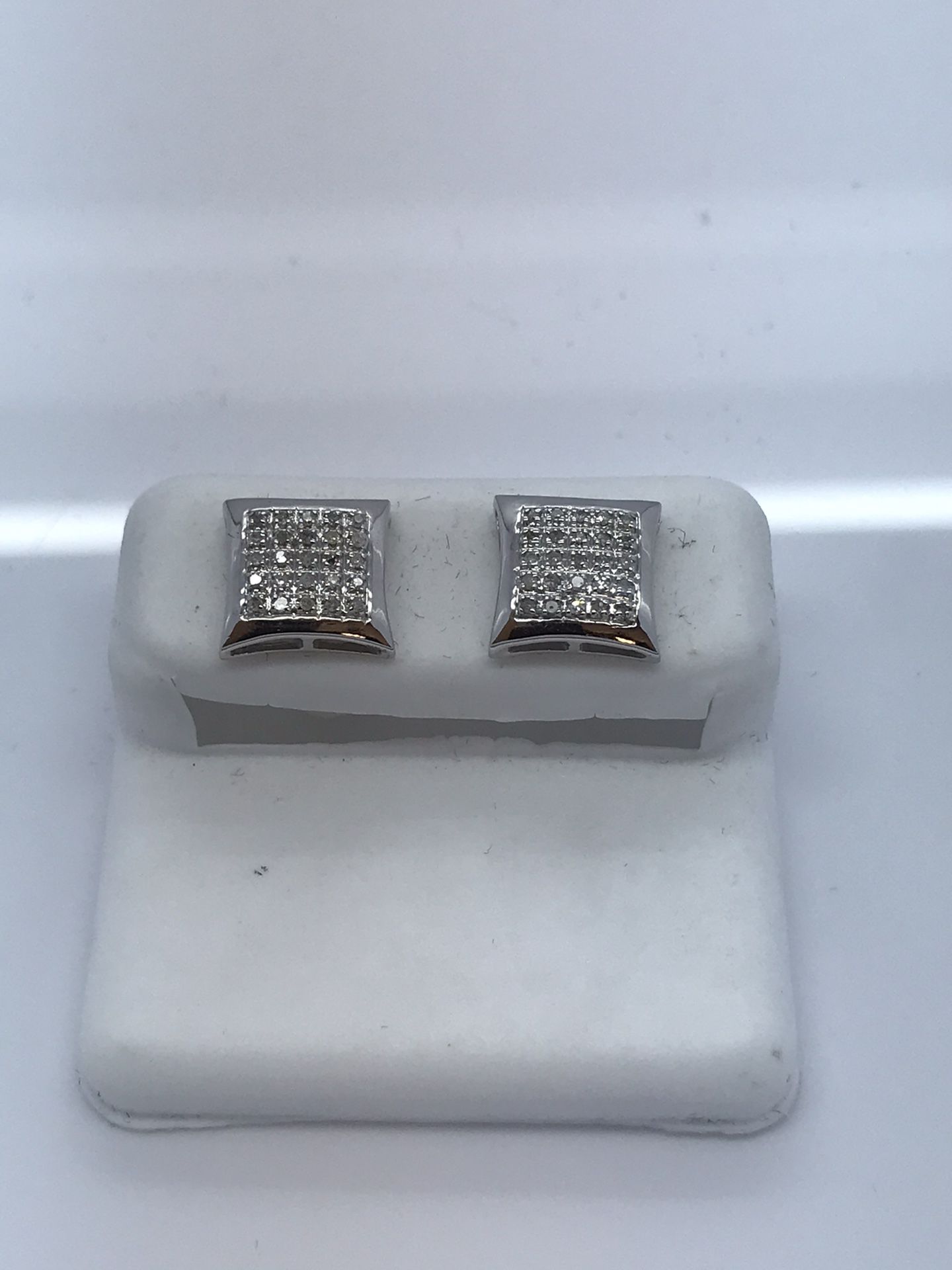 10k white gold earrings with .15 carat diamonds