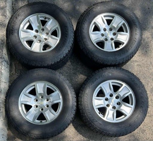 17 Inch Chevy Wheels And Like New Tires