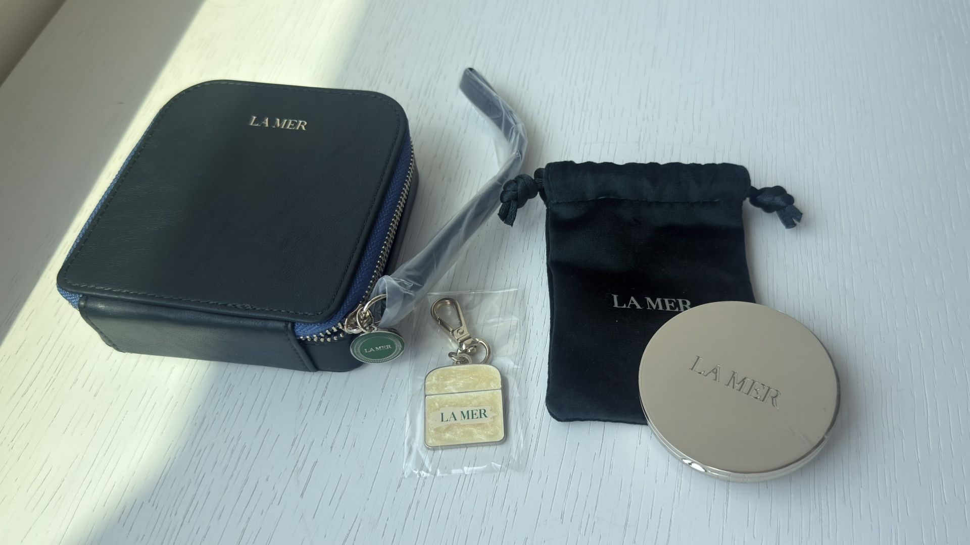 La Mer Mirror/ Key Chain/ Punch