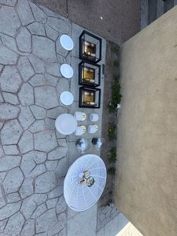 It's not free, but shoot a price, Mixed Lot of Light Fixtures and Shades