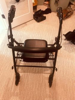 Black Four-Wheel Rollator Walker with Seat