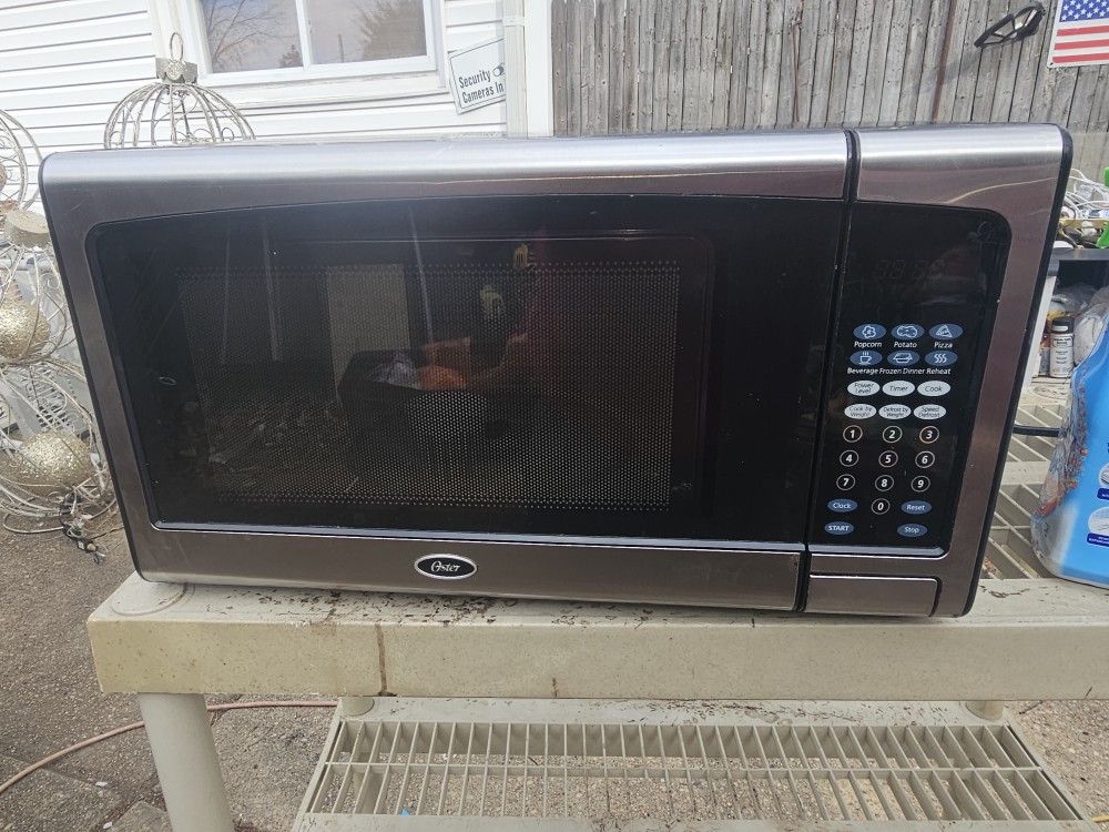 Prices Firm.. Microwave Oven
