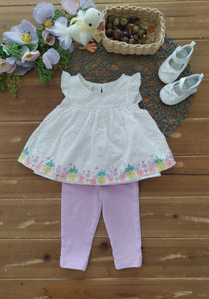 12MOS 2-PIECE OUTFIT WHITE ANGEL SLEEVES EYELET TUNIC W/FLORAL & PINEAPPLE PRINT HEM AND COORDINATNG LAVENDER CAPRI LEGGINGS 