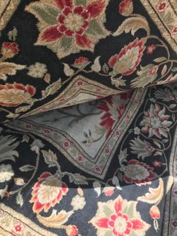 Very large maybe 10 x 12 Ft or so rug used as is or wash