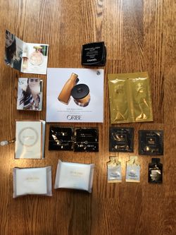 Chanel small foundation packet, two small coach perfumes, small Armani packets, Ellen Tracy small spray perfume, Oribe lotions etc. $16-