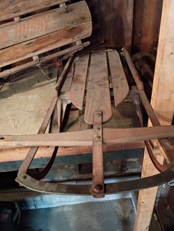 2 Mid 70s wooden/steel snow sleds