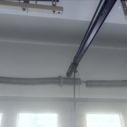 Spring And Garage Door Opener