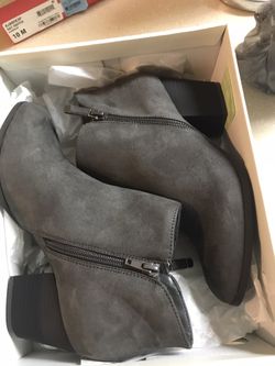 Style & Co's Masrinaa booties curve gently along the topline, coming to a V where two fashionable zippers line up the sides. Almond-toe booties with