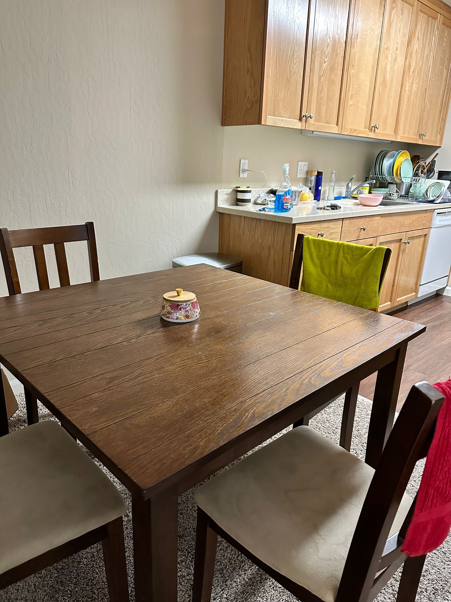 Solid Wood Dining Table And Cushioned Chairs