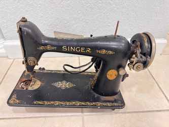 Singer sewing machine antique . Looks a great piece for decoration .