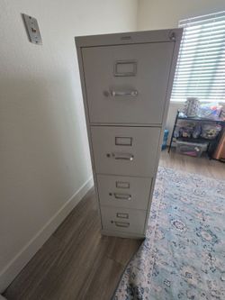 4 tier file cabinet with key