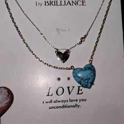 2 Separate Necklaces Each With Hearts