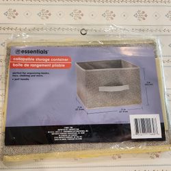 New Essentials collapsible storage container is a versatile organization bin featuring a pull handle for easy access, 
Dimensions:  11 in x 1
