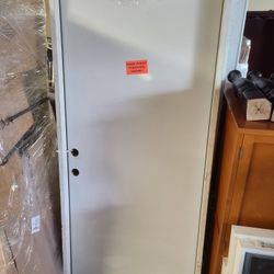 Exterior Steel Flat Door with Frame. New, never installed, and right swing