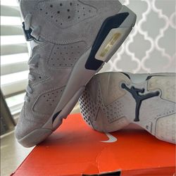 Stylish womens wolf gray Air Jordan 6 with blue accent