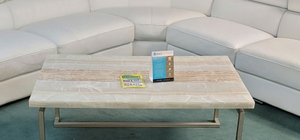 Whites Leather Sectional. Free 65 In Tv With Purchase!