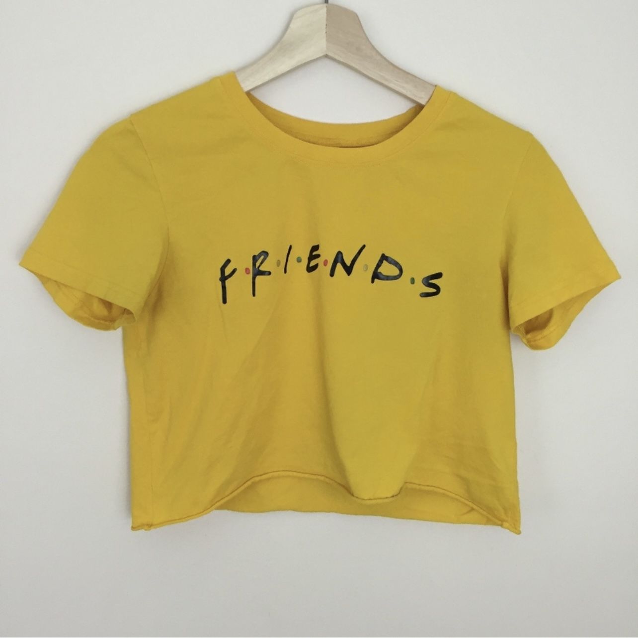 FRIENDS Yellow Graphic Crop Top Raw Hem Tee