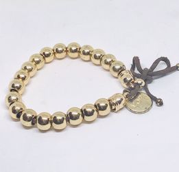 MOHE bracelet with gold tone beads and genuine leather rope