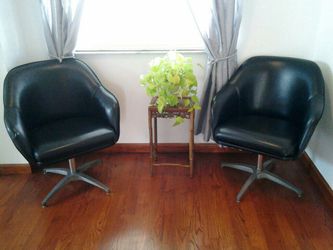 Two Art Deco Antique Faux Leather swivel Matching Chairs in Black