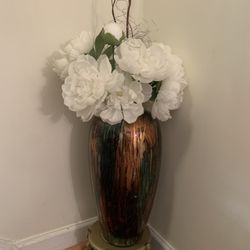 long vase with clear flower 