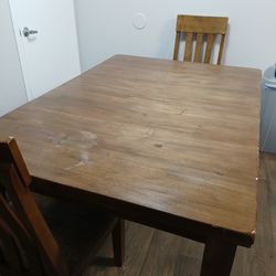 Brown Solid Wood Table With Leaf 