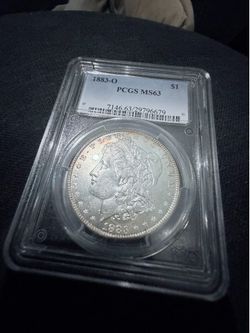 1883-O Morgan Dollar $1 PCGS MS63 New Orleans Rainbow Toning