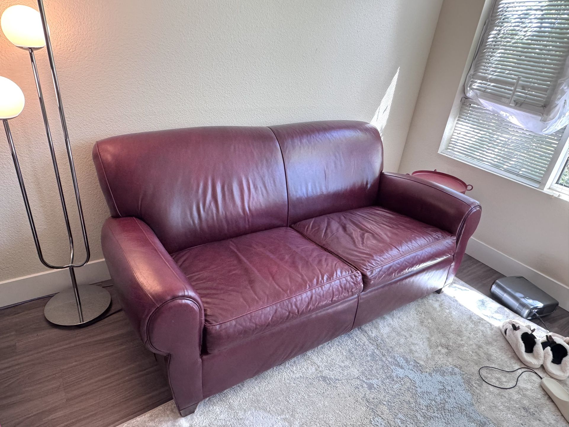 Red leather couch / loveseat