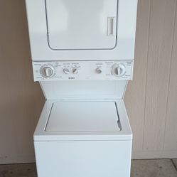 KENMORE, WASHER  AND  DRYER  ELECTRIC  STACKABLE. 24"wide