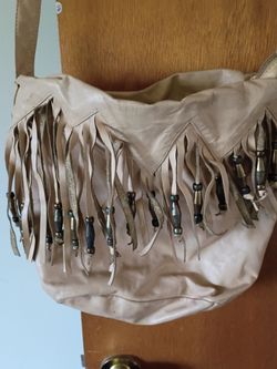 Cream colored leather tote crossbody