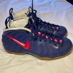 MAKE AN OFFER! Mens 11.5 Nike Air Foamposite Pro "USA" sneakers, featuring a distinctive patriotic colorway with a "Blue Void" shell and bold red acce