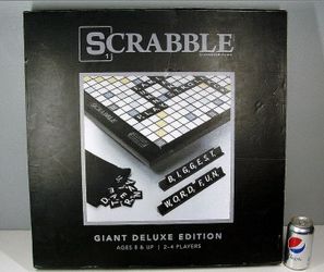 GIANT SCRABBLE GAME. 1 BRAND NEW AND 1 USED