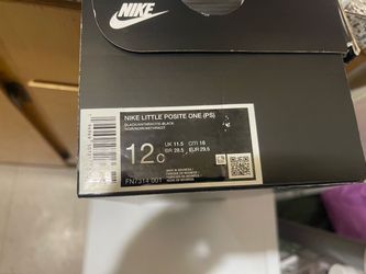 Black kid’s Foamposite