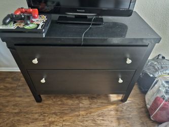 Granite top to door dresser