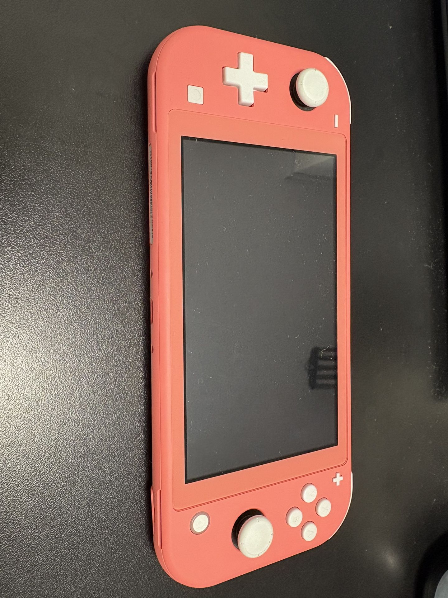 Nintendo Switch Lite coral