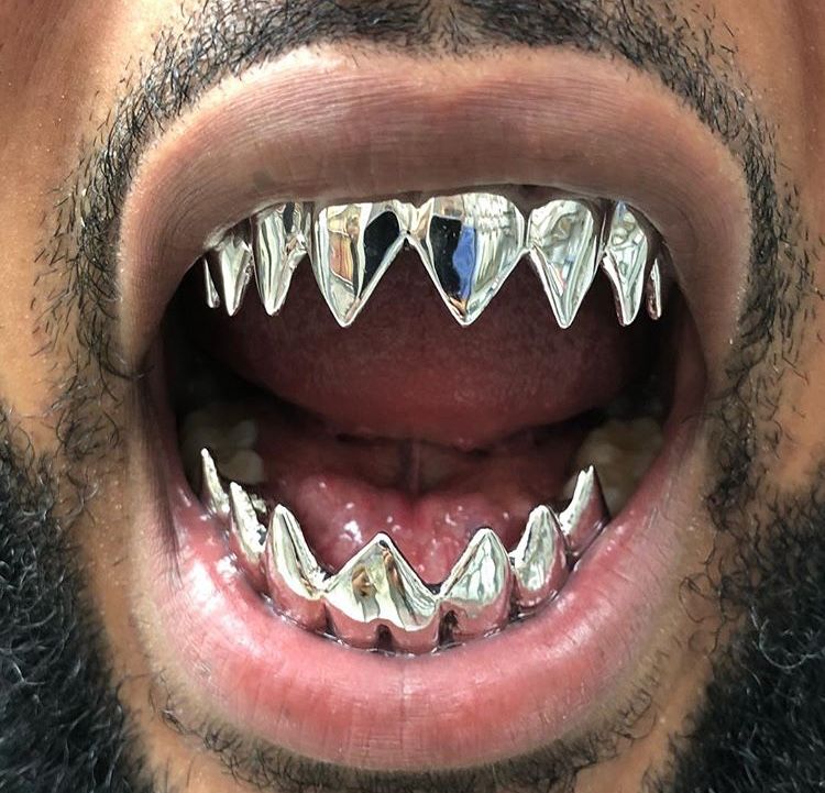 Shark teeth 10k gold grillz available at Bennani Jewelers at Park Meadows mall