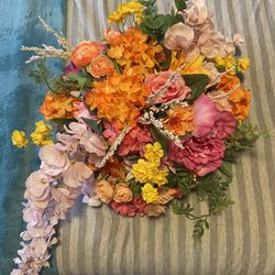 8 orange and pink floral arrangements 