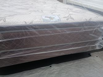 Brand new queen size pillowtop mattress and box spring free delivery depends on location