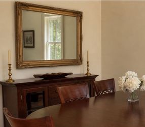 Framed mirror with beveled glass