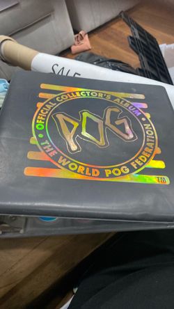 Vintage Pog album full of pogs