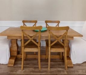 Wood pedestal dining table