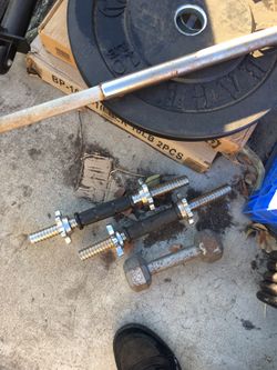 Dumbbell handles bumper weights and many other gym equipment