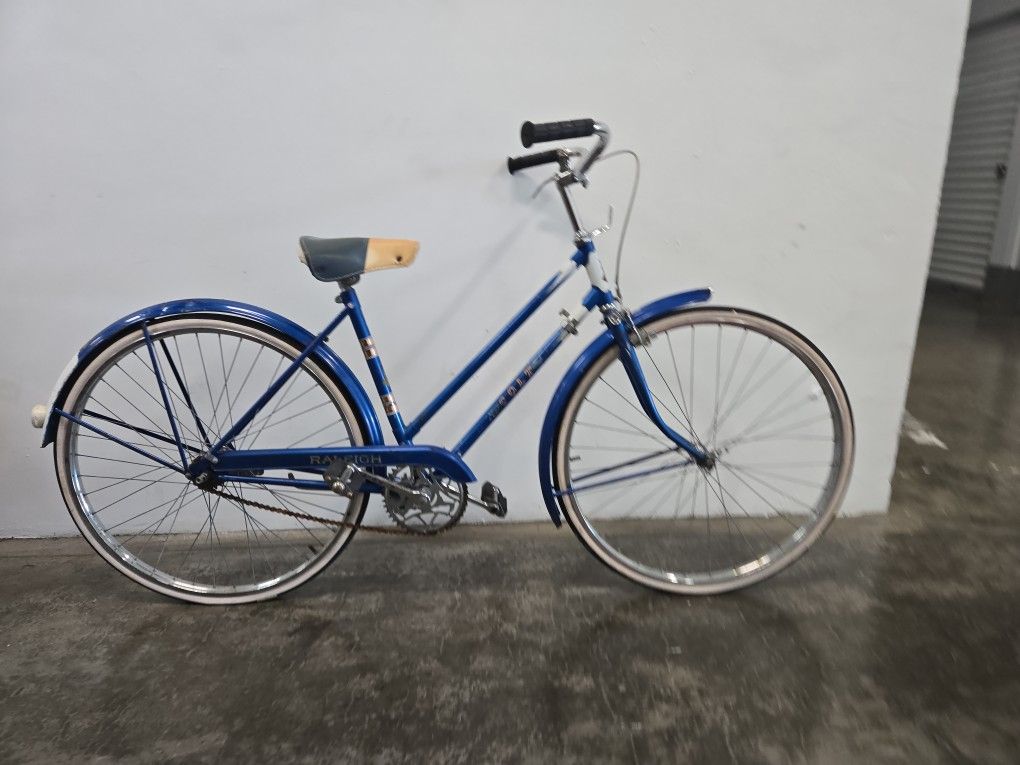 Vintage, probably fully original Ladies Raleigh 3 speed cruiser bike.