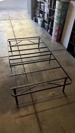 Folding metal bed frame (74” x 37.5”)