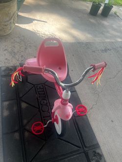 Pink radio flyer tricycle