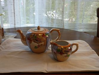 Hand-painted teapot and creamer