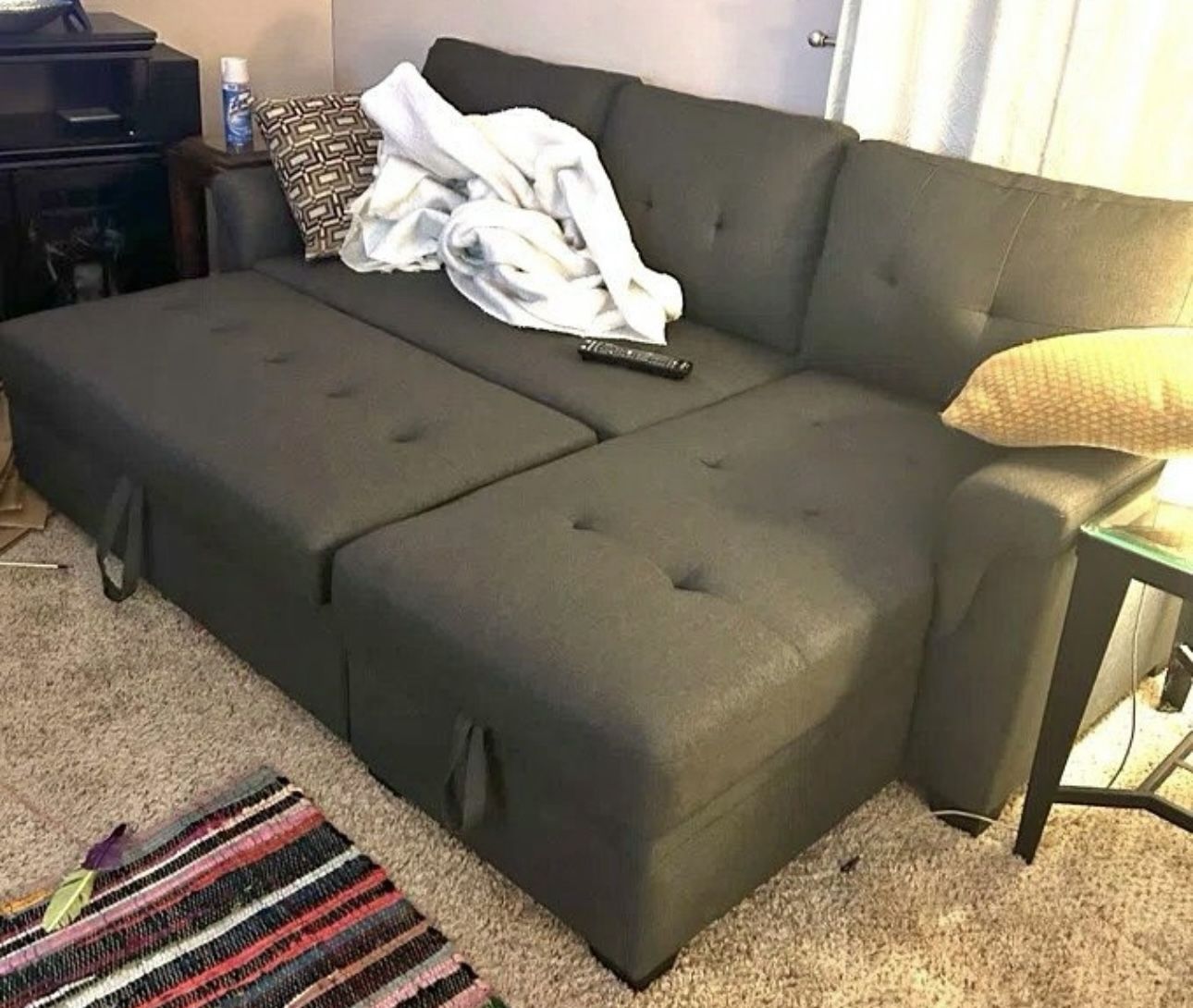 BLACK SECTIONAL - PULL OUT SLEEPER