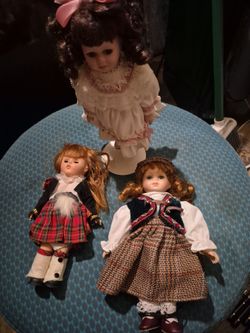 3 small porcelain dolls all 3 $10.00